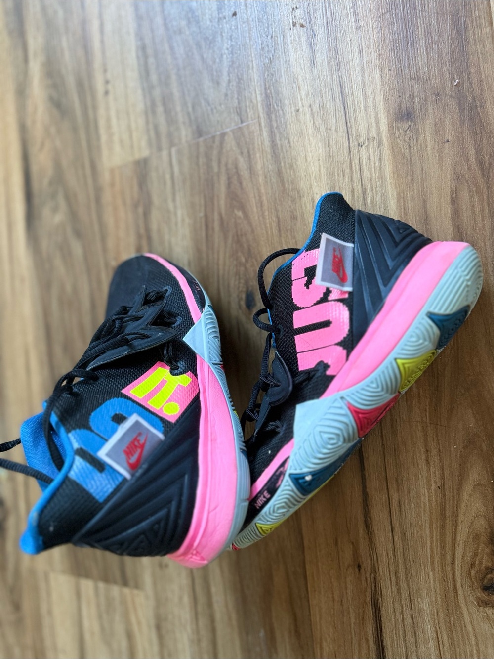 Black Nike Sneakers with Pink and Blue Accents